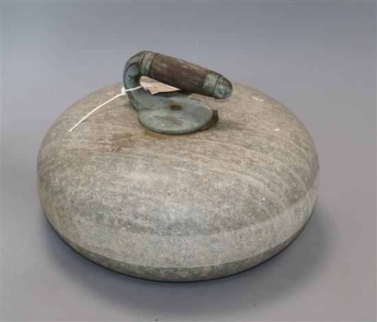 A vintage curling stone